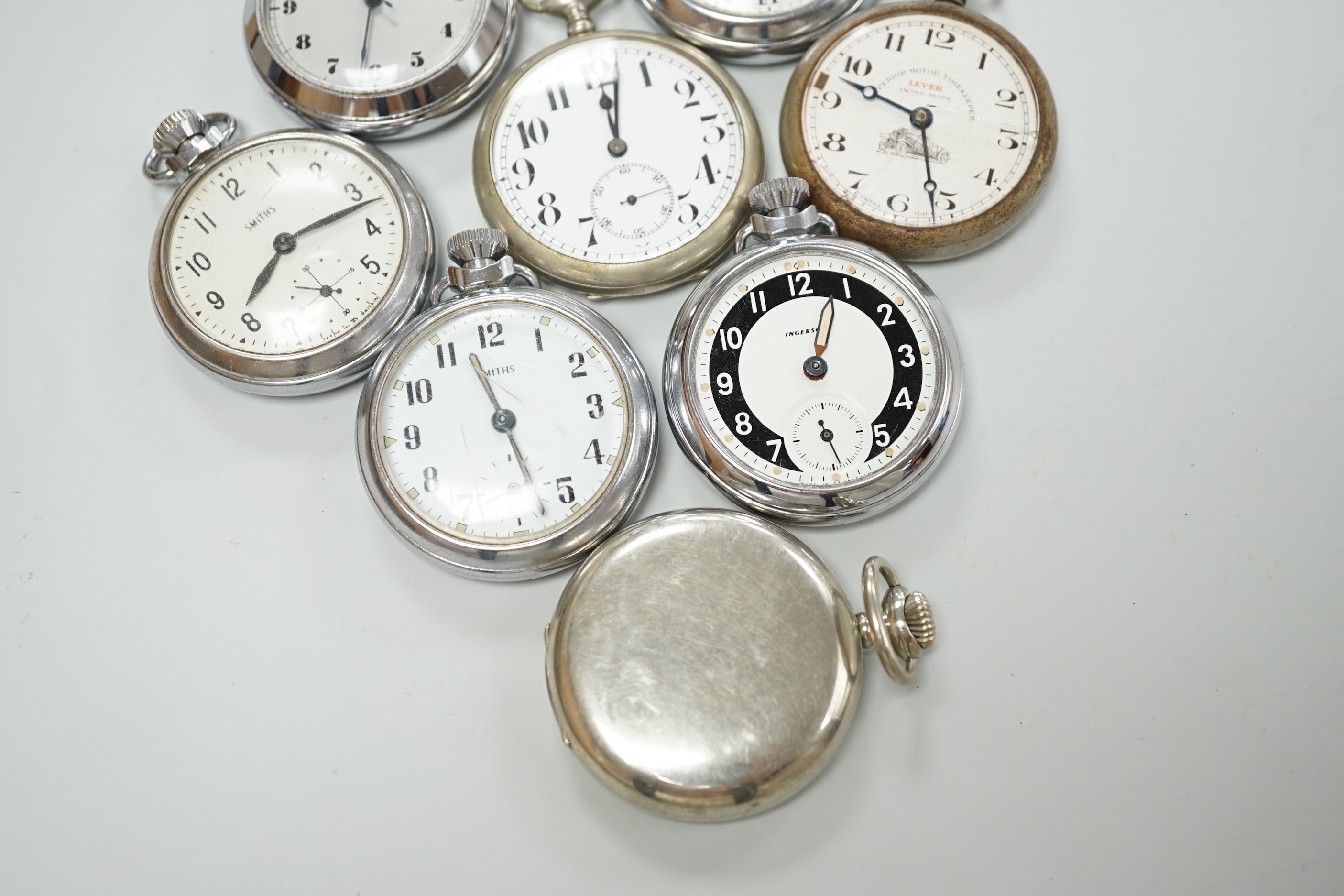 Eight assorted chrome or nickel cased pocket watches, including three Smiths, two Ingersoll, one Record and two others.